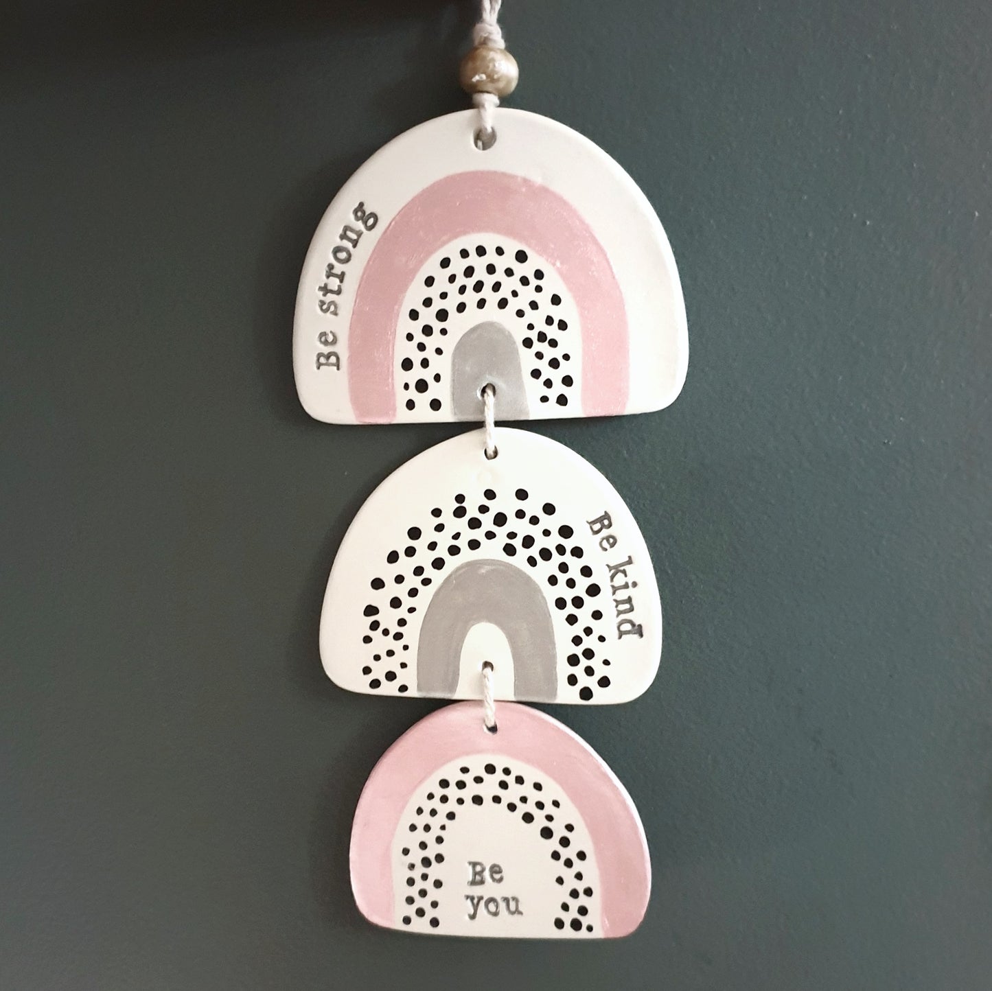 Pink spotty 'Be strong' rainbow wall hanging